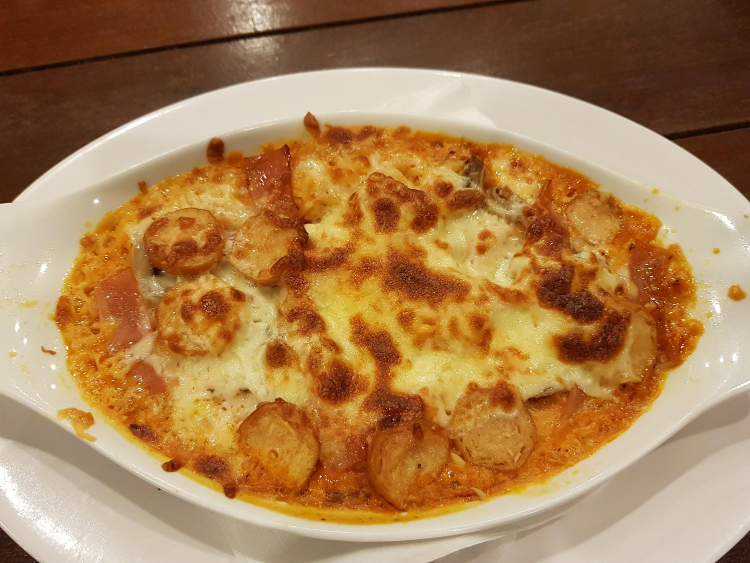 Chicken Ham and Sausage Baked Rice